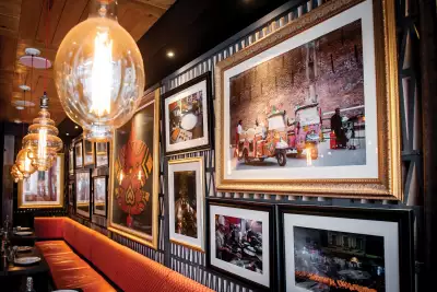 Karahi Boys' authentic Pakistani food | Framed photos line the walls at Karahi Boys