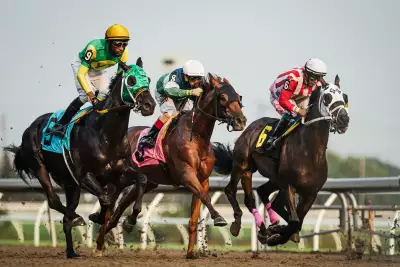 Horses racing at Woodbine Racetrack in Etobicoke