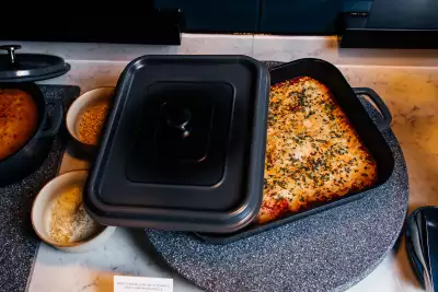 A dish of hot food inside the Aspire | Air Canada Caf&eacute; at Billy Bishop Toronto City Airport