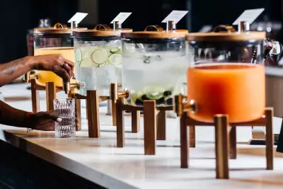 Drink options in dispensers inside the Aspire | Air Canada Caf&eacute; at Billy Bishop Toronto City Airport