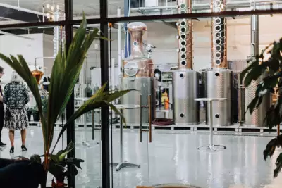 Toronto distilleries and alcohol stores | A still on the other side of a glass wall at Reid's Distillery in Toronto