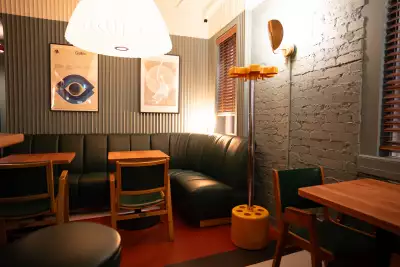 Toronto bottle shops and alcohol stores | Doc&rsquo;s Green Door Lounge is full of fun furniture and cozy nooks