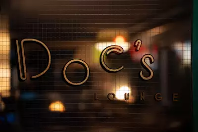 Toronto bottle shops and alcohol stores | The sign outside Doc&rsquo;s Green Door Lounge