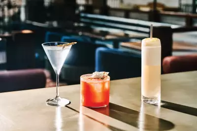 Three cocktails on the bar at Civil Works in Toronto