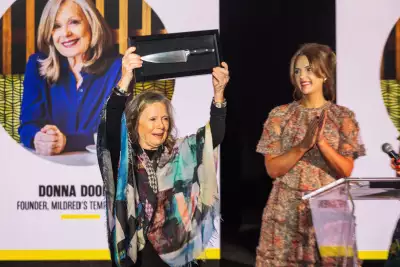 The 2024 foodism ICON Awards | Donna Dooher holds up her award at the foodism ICON Awards