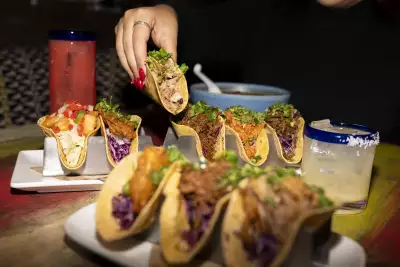 New restaurants in Toronto | Two trays of classic tacos and a margarita at Blanco Cantina in Toronto