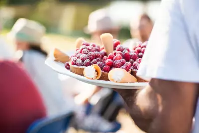Outdoor dining experiences in Canada | Someone serving dessert at the Araxi Longtable Dinner in Pemberton, B.C.