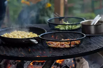 Outdoor dining experiences in Canada | Cooking over a fire at Down Home in Grey County, Ontario
