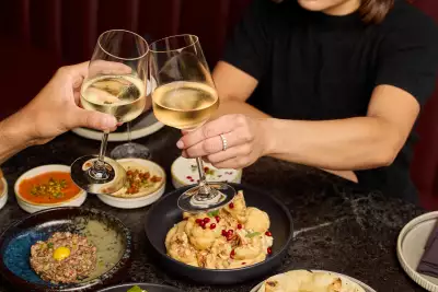 Toronto food news | A spread of lunch dishes and wine at Lyla
