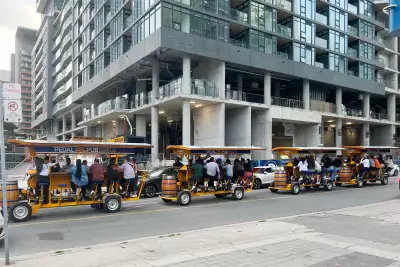 Pedal Pubs lined up on a Toronto street