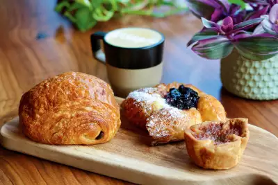Best caf&eacute;s and coffee shops in Toronto | A croissant, blueberry danish and toffee tart at Understory Cafe
