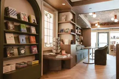 Best caf&eacute;s and coffee shops in Toronto | Shelves of books and seating at Book Bar