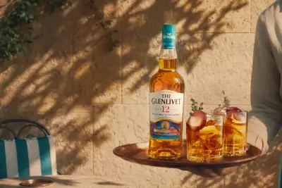 The Glenlivet 12 Year Old Beyond Speyside Series: Provence Edition on a tray with cocktails