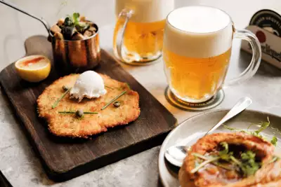 Pilsner Urquell with a spread of dishes