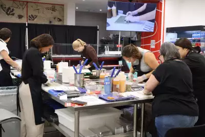 The foodism team rolling sushi in the Bento test kitchen