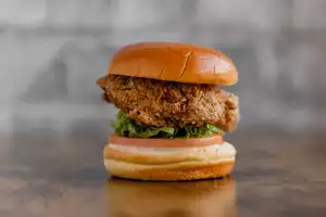 Toronto's best new restaurants for summer | Ghost Chicken's spicy and stacked sandwich