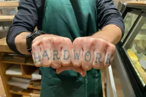 A staff tattoo at Russell's Butcher & Deli A staff tattoo at Russell's Butcher & Deli