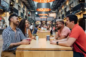 Manitoba restaurants | Friends have a drink at The Forks, Manitoba Manitoba restaurants | Friends have a drink at The Forks, Manitoba