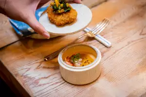 Supper clubs in Toronto | A chicken nugget with a soup underneath Supper clubs in Toronto | A chicken nugget with a soup underneath
