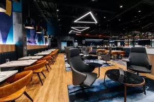 Comfortable seating inside the Aspire | Air Canada Café at Billy Bishop Toronto City Airport
