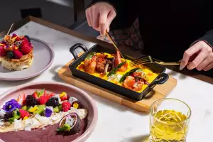 Best new Toronto restaurants | Digging into a lobster dish at Glass Kitchen