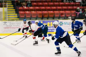 Hockey players at the Barn Burner all-star hockey game in Prince Edward County