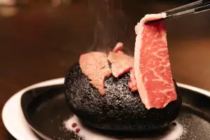 Best new restaurants in Toronto | Searing meat at Blue Bovine