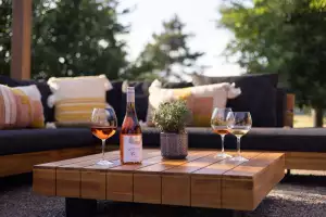 Ontario Wine Awards | Domaine Queylus wine on a table outside
