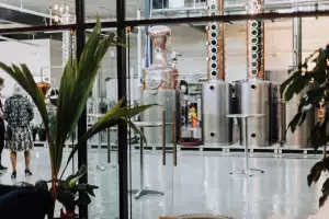 Toronto distilleries and alcohol stores | A still on the other side of a glass wall at Reid's Distillery in Toronto
