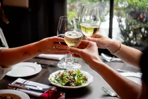 New restaurants Toronto | Guests enjoying champagne at Biff's Bistro