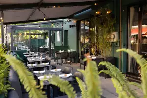 New restaurants Toronto | The lush patio at Vinoteca Pompette
