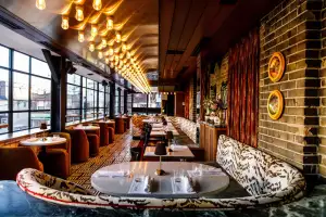 New restaurants in Toronto | Large windows and funky decor inside Piano Piano on Bloor