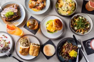 Best new restaurants Toronto | A spread of dishes at Please & Thank You Toronto