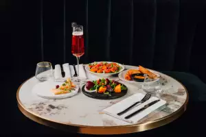 Best new restaurants Toronto | A spread of dishes and drinks at Campaniae by Delysées in Yorkdale