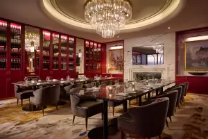 A chandelier hangs over the dining area at Frenchy Bar et Brasserie