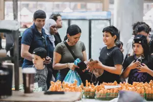 Best new restaurants Toronto | People shopping at St. Lawrence Market North