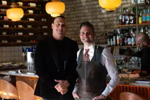 Q&A with Charlies Burgers | Charlies Burgers co-founders Donato Carozza and Franco Stalteri pose in front of a bar