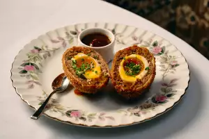 Best new Toronto restaurants | A plate with the Scotch Egg at Punch