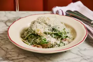 Best new Italian restaurants in Toronto | A leafy dish at Proper in Roncesvalles