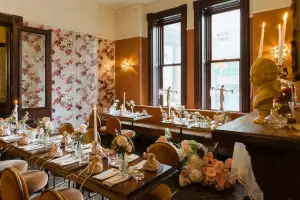 Best wedding venue restaurants in Toronto | The dining room decorated for a wedding inside Auberge du Pommier