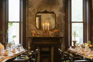 Best wedding venue restaurants in Toronto | The dining room decorated for a wedding inside Auberge du Pommier