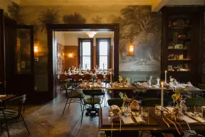 Best wedding venue restaurants in Toronto | The dining room decorated for a wedding inside Auberge du Pommier