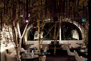 Farm-to-table dining in Qu&eacute;bec: The last dining phase takes place under indoor trees at Tani&egrave;re&sup3;, Qu&eacute;bec&rsquo;s only two-star Michelin spot