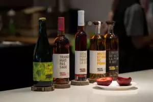 Farm-to-table dining in Qu&eacute;bec: A lineup of bottles at Cidrerie Michel Jodoin