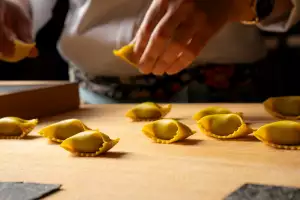 Pasta Privato Toronto | Little pillowy ravioli pasta on a worktop at Pasta Privato in Toronto