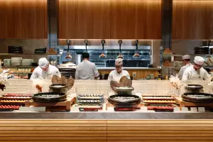 Chefs behind the sushi counter at Nobu during brunch