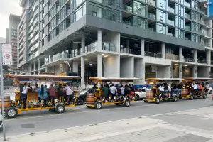 Pedal Pubs lined up on a Toronto street