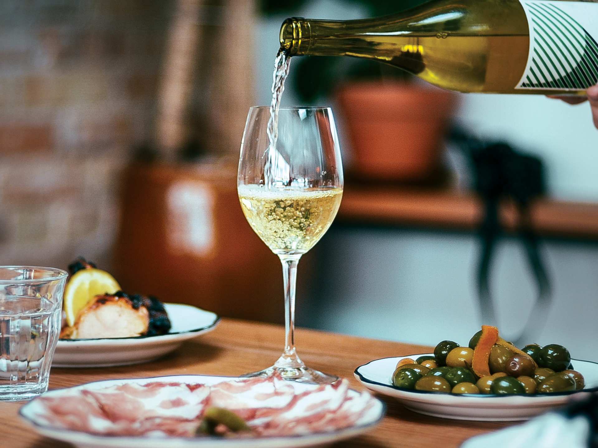 Best wine bars in Toronto |  Pouring wine at Paris Paris