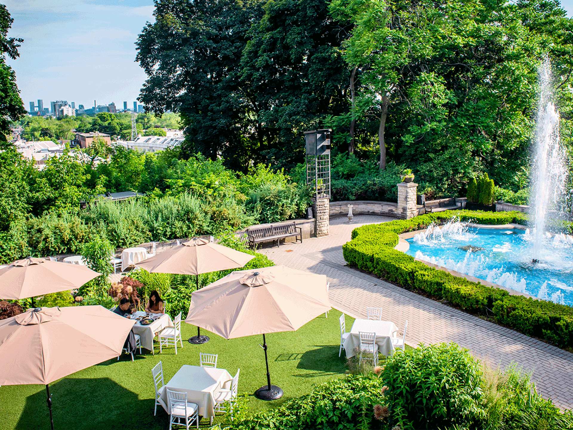 Best patios in Toronto | A fountain in The Gardens at Casa Loma