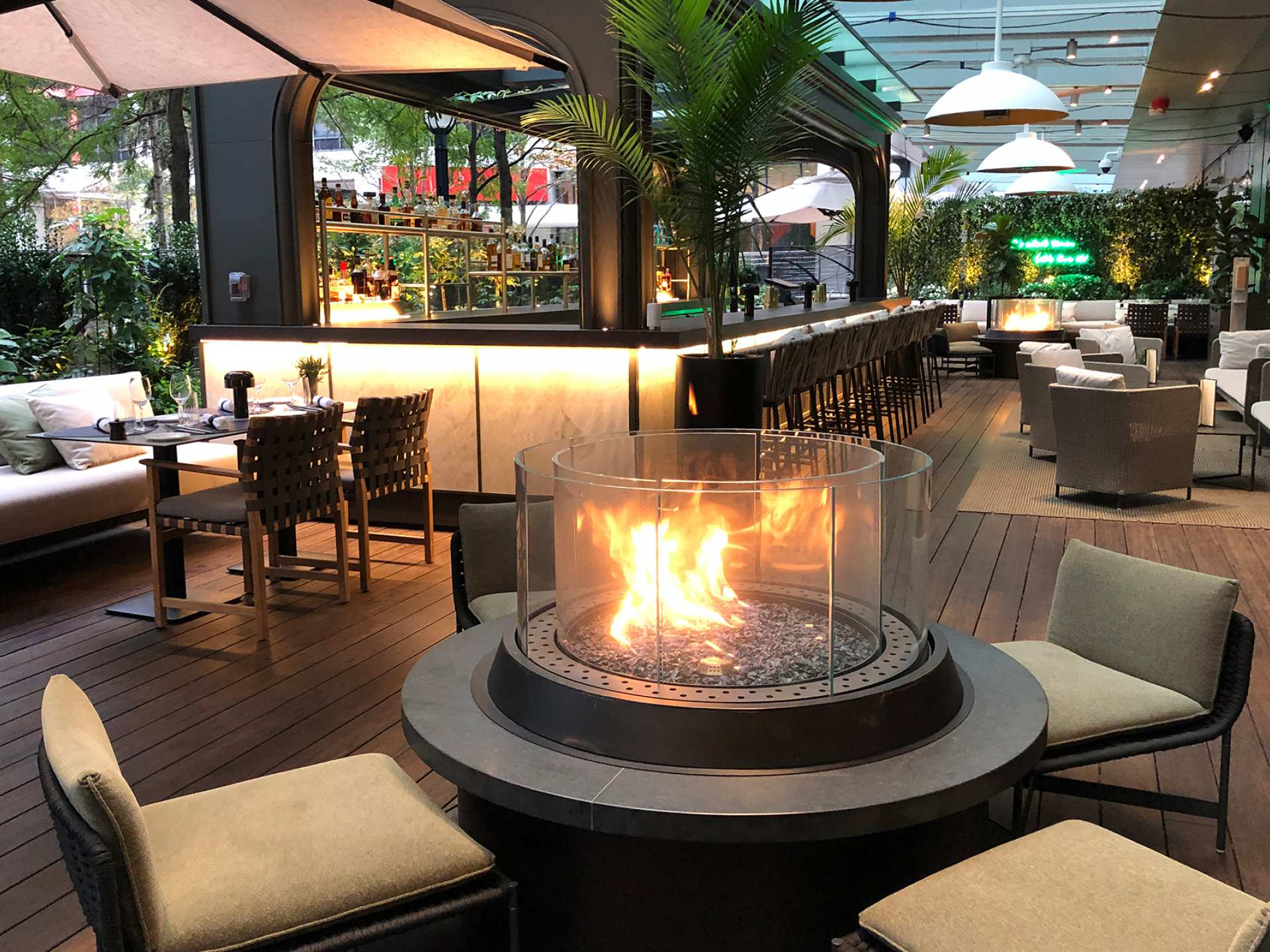 Best patios in Toronto | A fire pit on the patio at EPOCH Bar & Kitchen Terrace